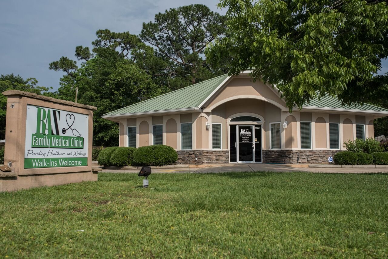 BAZ Family Medical Clinic at 4310 Chicot Street, with the Walk-Ins Welcome sign out front